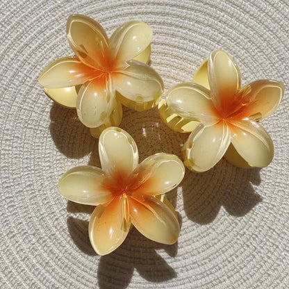 Pince à cheveux Tipanier – Élégance tropicale pour toutes vos coiffures